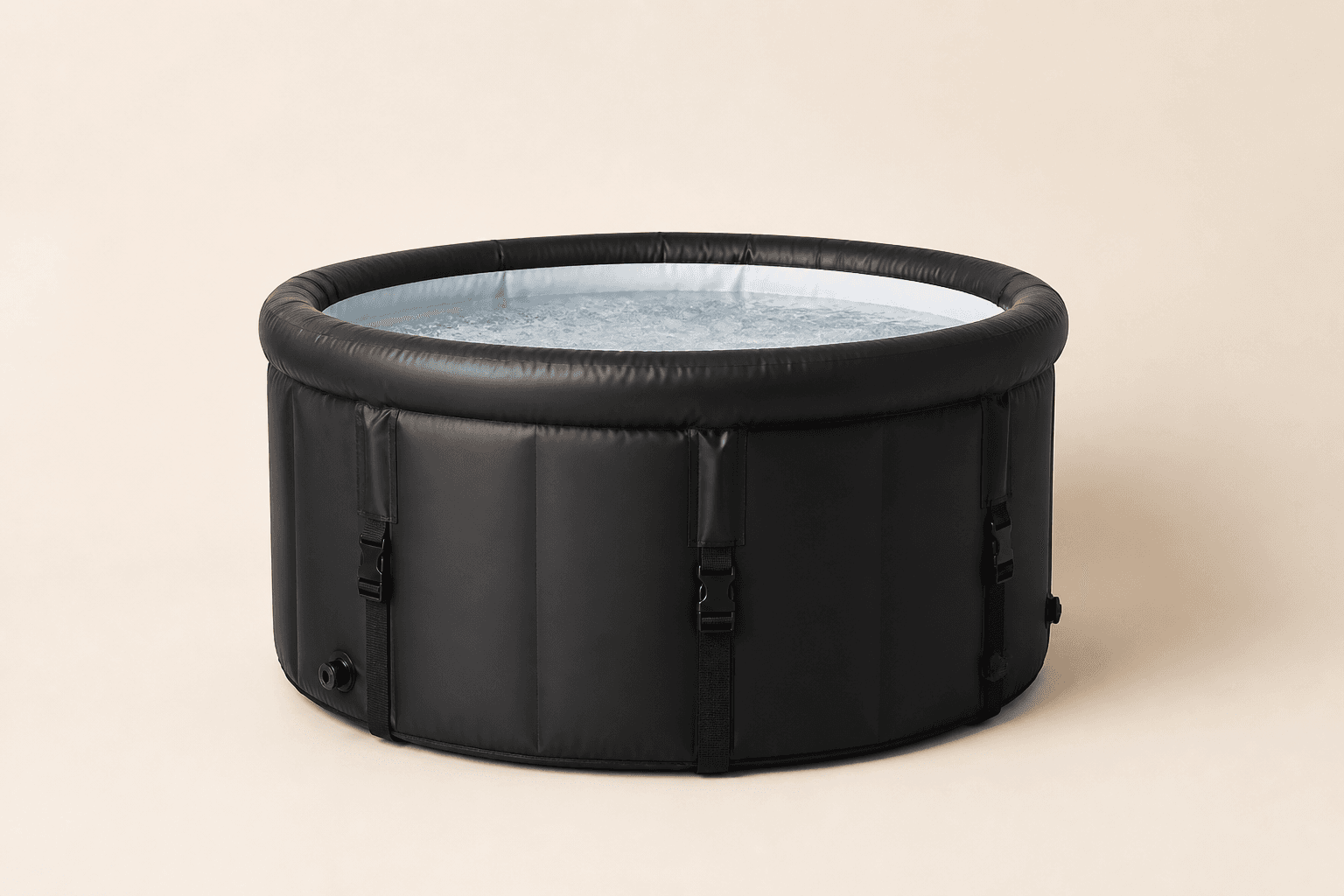 Inflatable cold plunge tub on a cream background